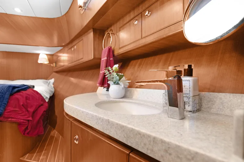 Slide: The Image of Luxurious bathroom interior of 2006 Noresman 480 Sedan yacht with elegant wood finish. - 27