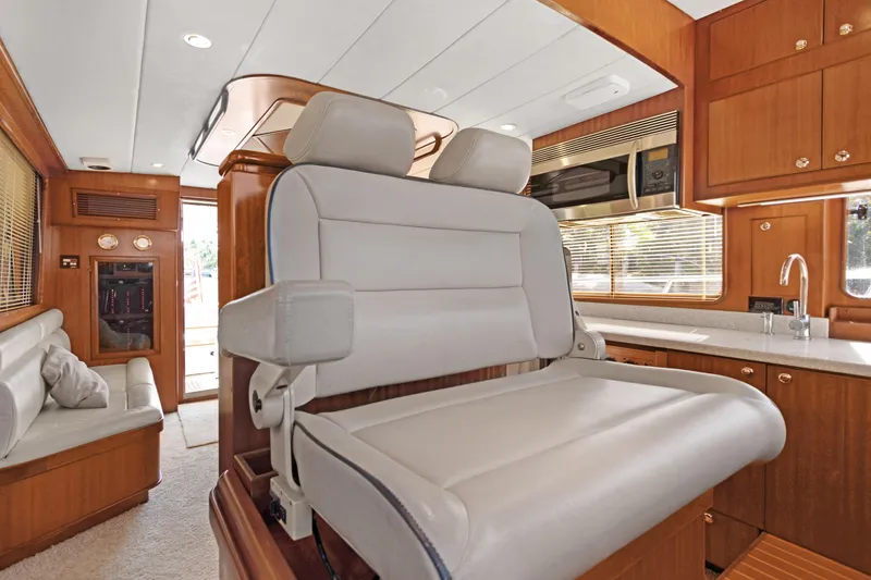 Slide: The Image of Luxurious interior of 2006 Noresman 480 Sedan yacht with plush seating and modern amenities. - 35