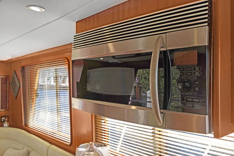 Slide: The Image of Modern kitchen interior in 2006 Noresman 480 Sedan with stainless steel microwave. - 39