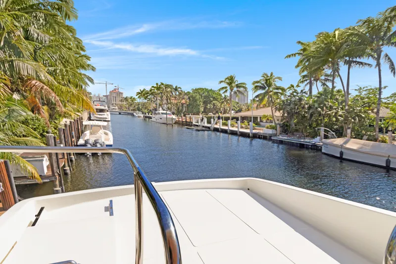 Slide: The Image of View from 2006 Noresman 480 Sedan yacht on a tropical canal with palm trees. - 56