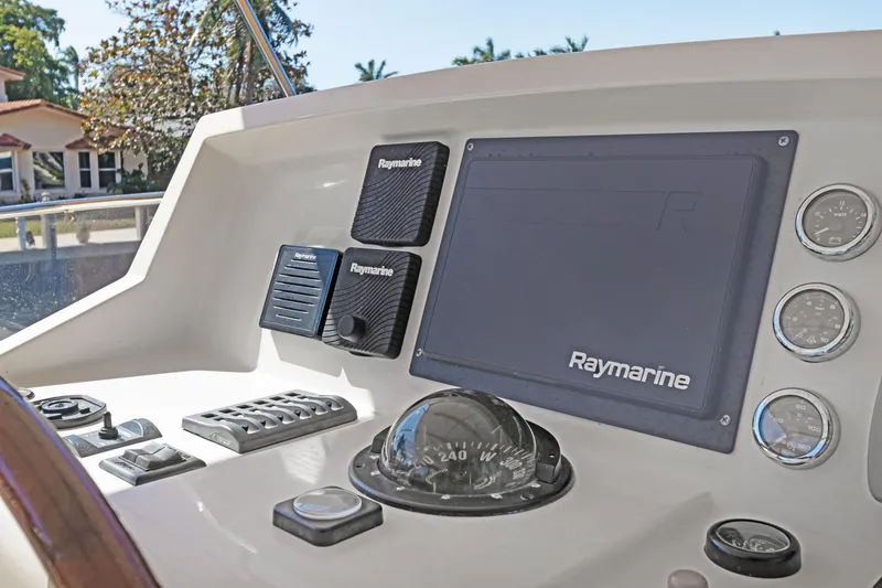 Slide: The Image of Helm of 2006 Noresman 480 Sedan with Raymarine navigation equipment. - 63