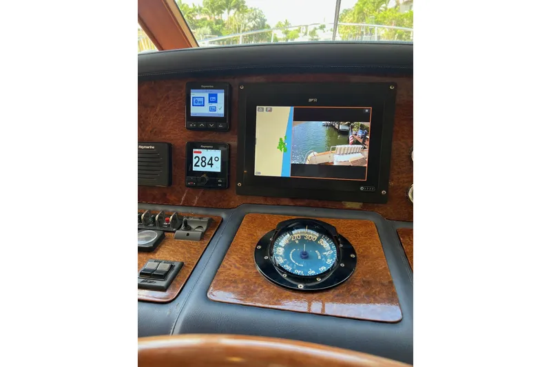 Slide: The Image of Control panel of a 2006 Norseman 480S yacht with navigation instruments. - 75