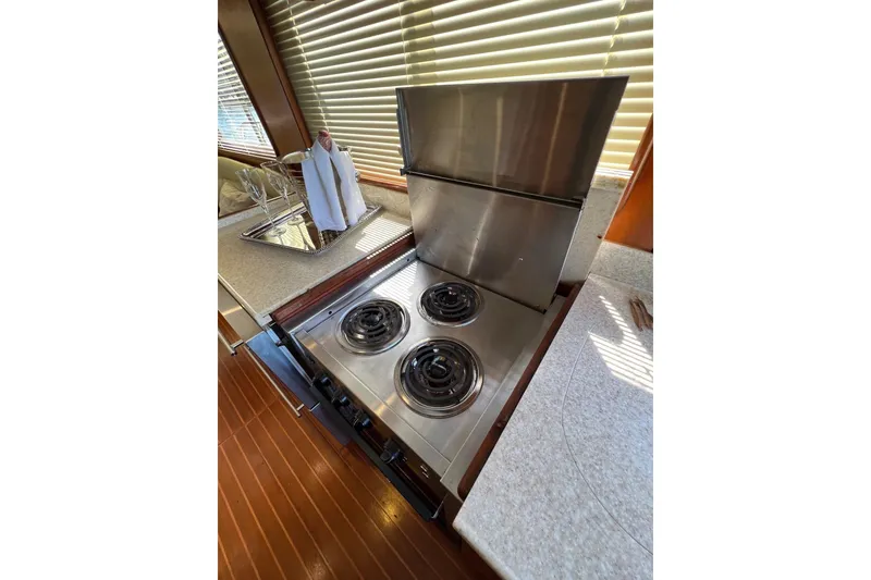 Slide: The Image of Stainless steel stove in 2006 Norseman 480S yacht kitchen with wooden flooring. - 79