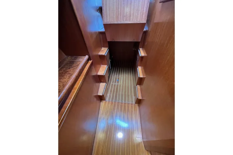 Slide: The Image of Wooden interior stairs on a 2006 Norseman 480S yacht. - 82