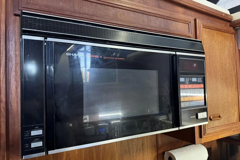 Slide: The Image of Sharp Carousel II convection microwave in 1987 Carver 42 Aft Cabin Motor Yacht kitchen. - 37