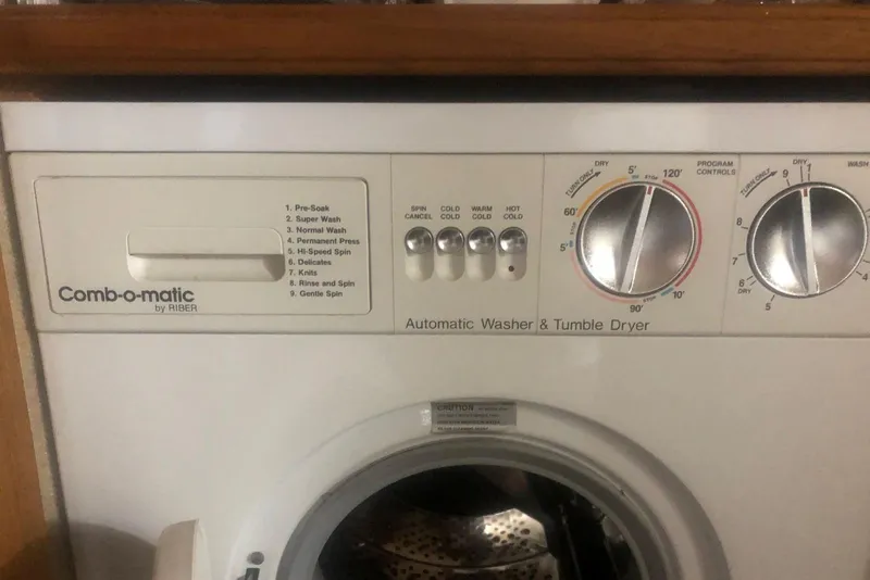 Slide: The Image of Automatic washer and dryer controls on a 1987 Carver 42 Aft Cabin Motor Yacht. - 46