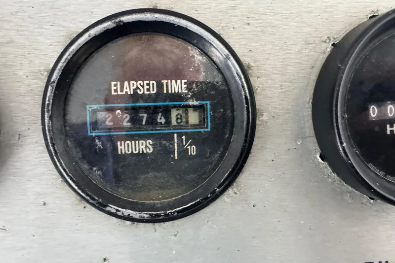 Slide: The Image of Elapsed time gauge showing 2274.8 hours on 1987 Carver 42 Aft Cabin Motor Yacht. - 18