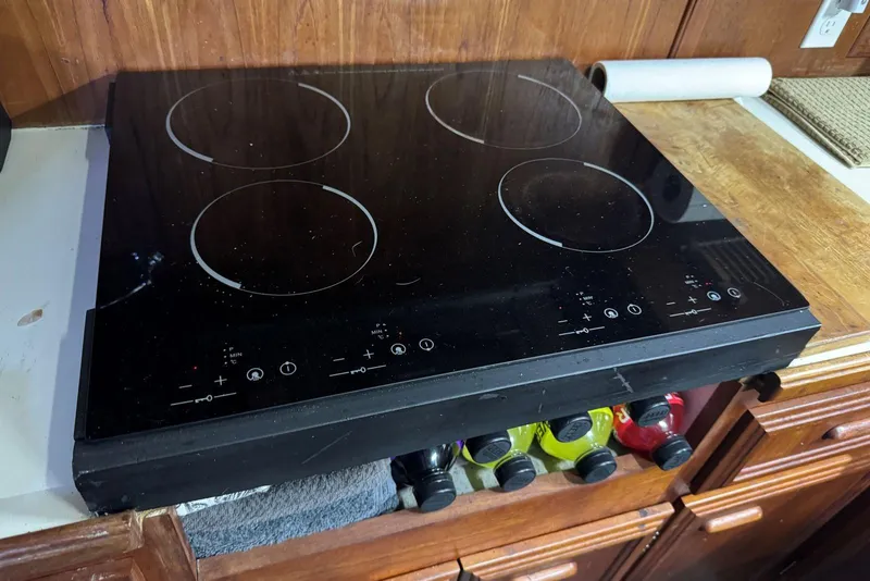 Slide: The Image of Induction cooktop on 1987 Carver 42 Aft Cabin Motor Yacht kitchen counter. - 36