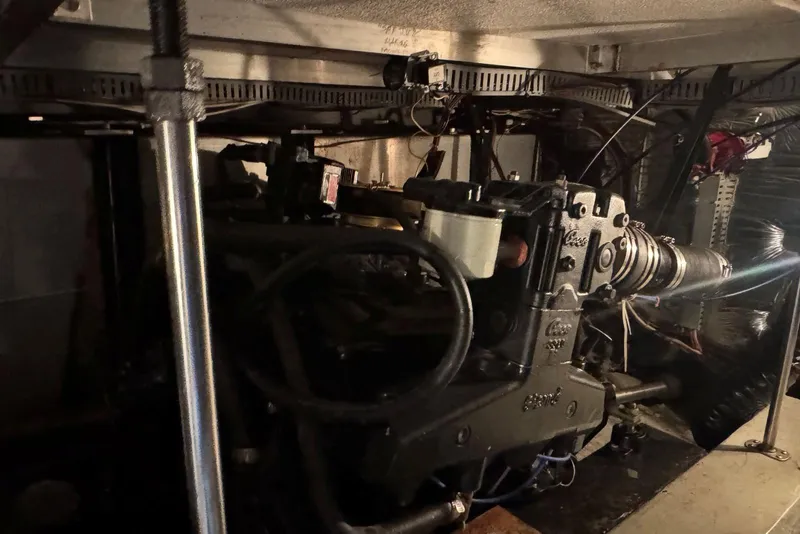 Slide: The Image of Engine room of 1987 Carver 42 Aft Cabin Motor Yacht, showcasing mechanical components. - 53