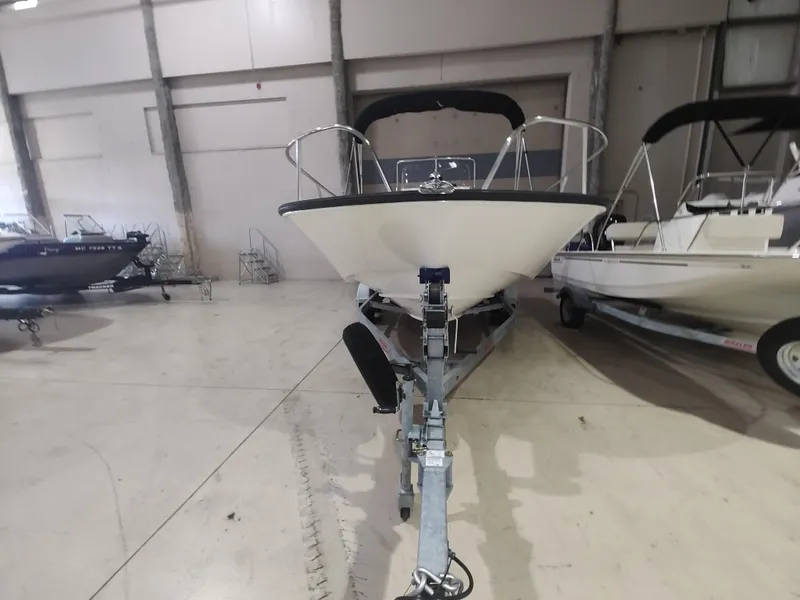Slide: The Image of 2022 Boston Whaler 190 Montauk boat in indoor storage facility. - 5