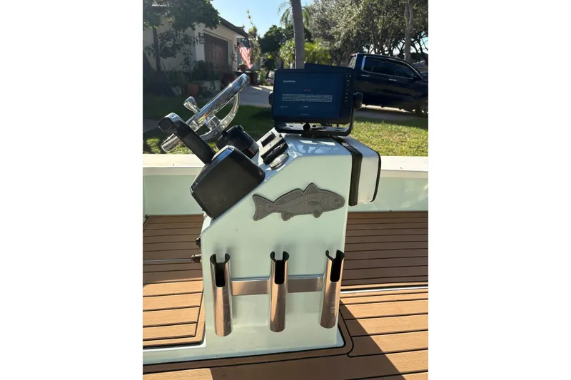 Slide: The Image of 2019 Skimmer Skiff 16'6" CC boat cruising on a scenic river with autumn trees. - 15