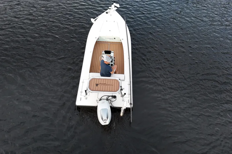 Slide: The Image of 2019 Skimmer Skiff 16'6" CC boat on water, aerial view. - 21