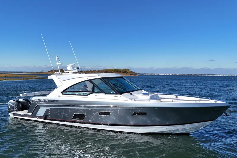 Slide: The Image of 2021 Formula 400 Super Sport Crossover yacht cruising on open water. - 4