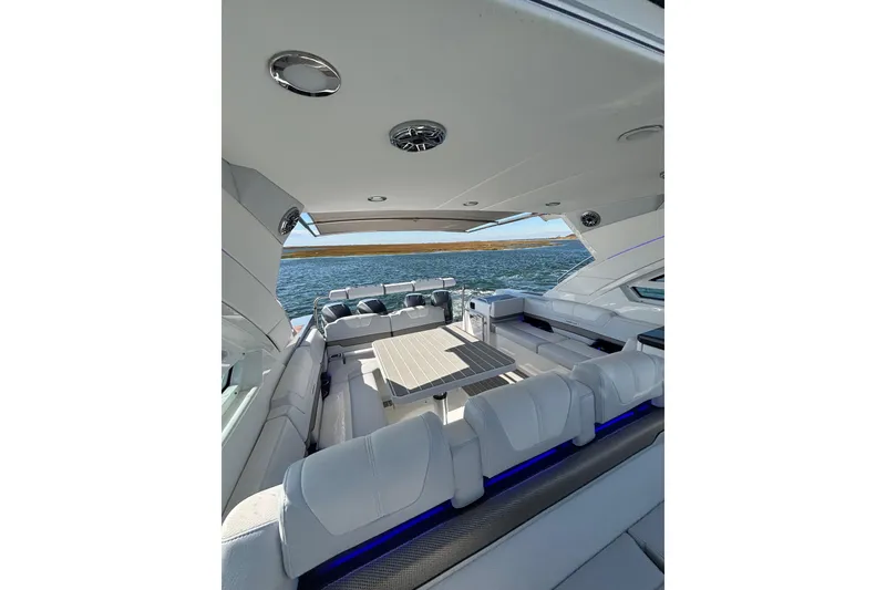 Slide: The Image of 2021 Formula 400 Super Sport Crossover interior with luxurious seating and ocean view. - 51