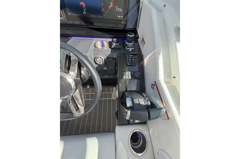 Slide: The Image of 2021 Formula 400 Super Sport Crossover helm with advanced controls and navigation display. - 55