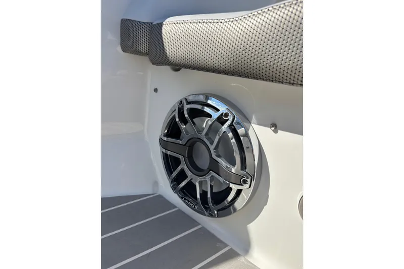 Slide: The Image of 2021 Formula 400 Super Sport Crossover boat speaker detail with cushioned seating. - 59