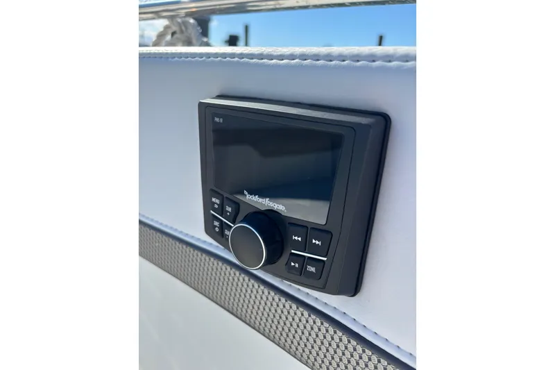Slide: The Image of Rockford Fosgate audio control panel on 2021 Formula 400 Super Sport Crossover boat. - 60