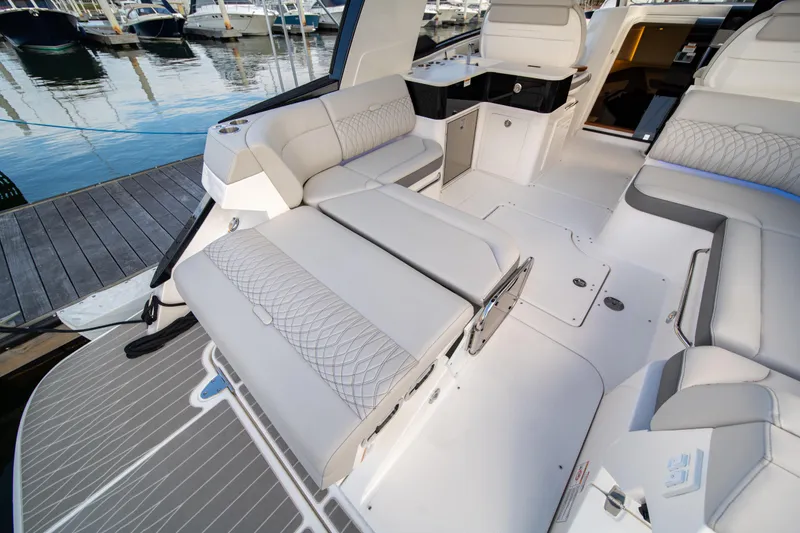 Slide: The Image of Luxurious 2024 Sea Ray Sundancer 370 yacht interior with elegant seating and modern design. - 10