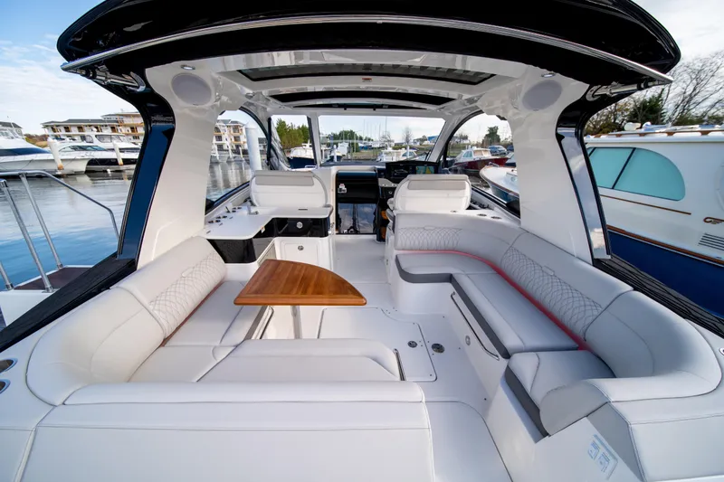 Slide: The Image of Luxurious 2024 Sea Ray Sundancer 370 yacht interior with elegant seating and sleek design. - 11
