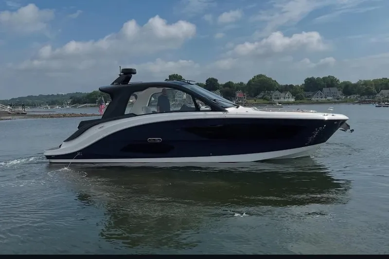 Slide: The Image of Luxurious seating area on 2024 Sea Ray Sundancer 370 yacht at marina. - 15