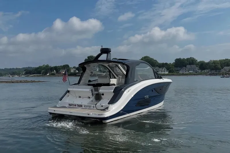 Slide: The Image of 2024 Sea Ray Sundancer 370 interior with sleek kitchenette and modern design. - 17