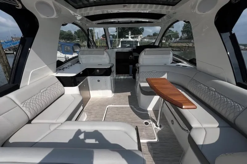 Slide: The Image of 2024 Sea Ray Sundancer 370 engine compartment with dual V8 engines. - 19