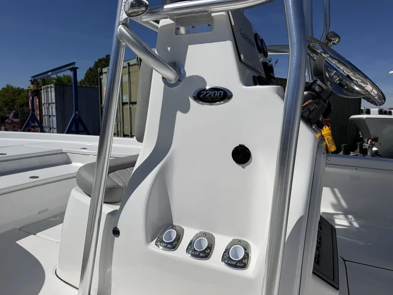 Slide: The Image of Blazer PureBay 2200 boat console, 2026 model, featuring controls and switches. - 11