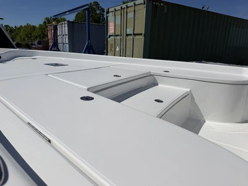 Slide: The Image of 2026 Blazer PureBay 2200 boat deck in sunlight. - 14