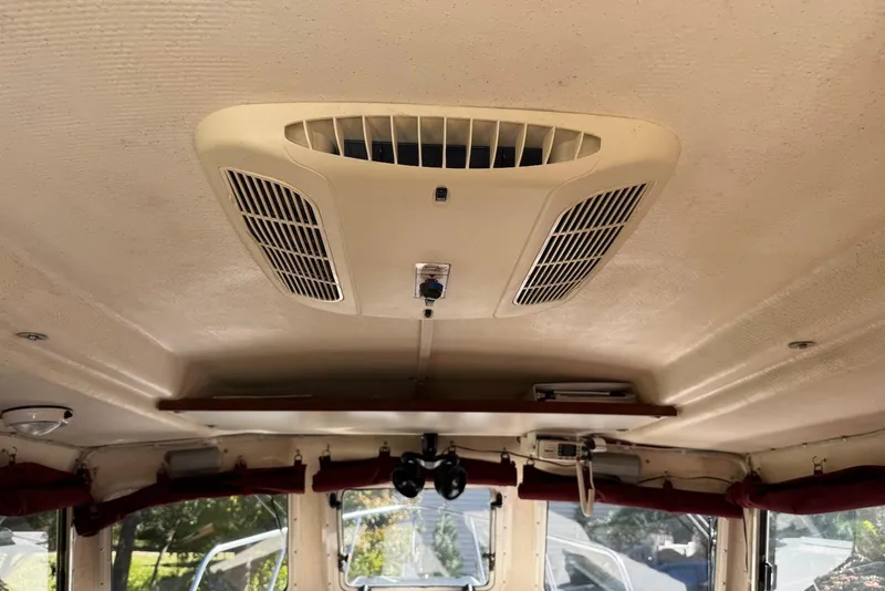 Slide: The Image of Ceiling view of 2007 C-Dory 25 Pilothouse with air vent and interior details. - 16