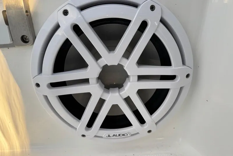 Slide: The Image of Close-up of JL Audio speaker on 2023 Wellcraft 262 Fisherman boat. - 23