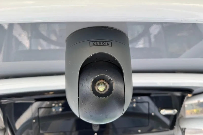 Slide: The Image of Close-up of a camera on a 2023 Wellcraft 262 Fisherman boat. - 24