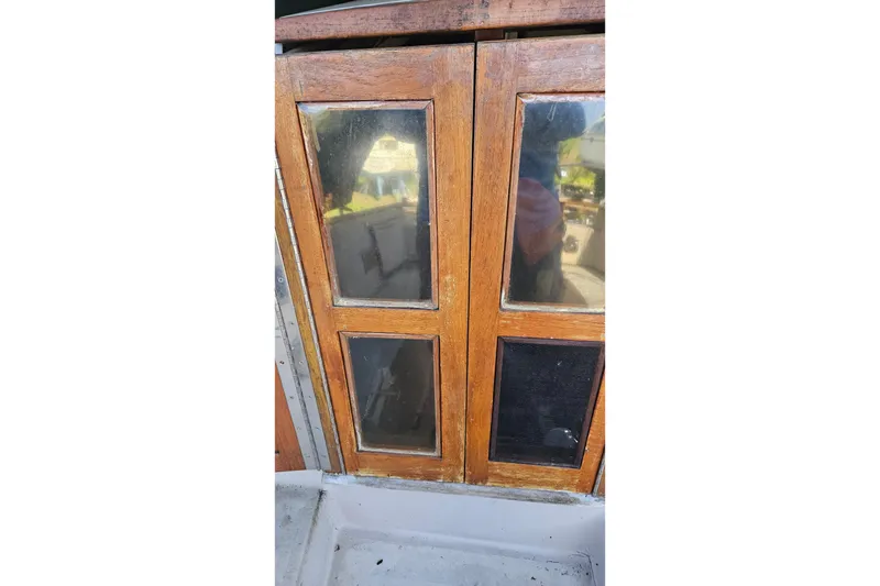 Slide: The Image of Covered winches and cleat on 1988 Bayfield 32C sailboat deck. - 13