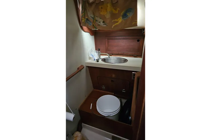 Slide: The Image of Close-up of 1988 Bayfield 32C sailboat deck with ropes and winch. - 21