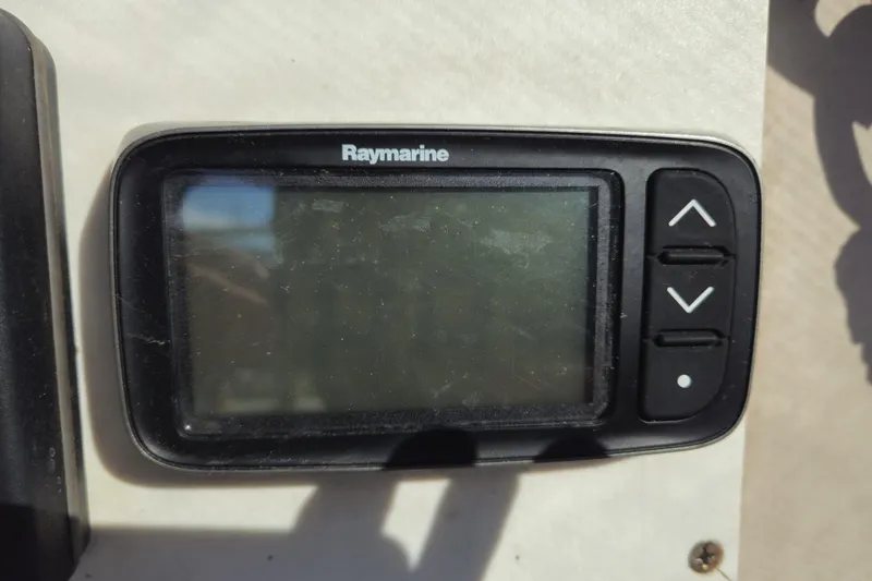 Slide: The Image of Raymarine display on 1988 Bayfield 32C sailboat, featuring navigation controls. - 31
