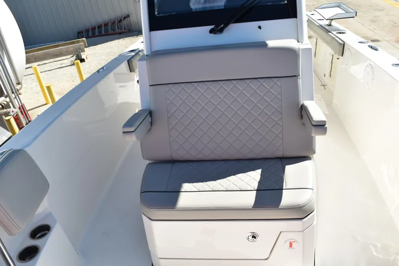 Slide: The Image of Control panel of a 2022 Pursuit S 268 Sport boat with labeled switches. - 22