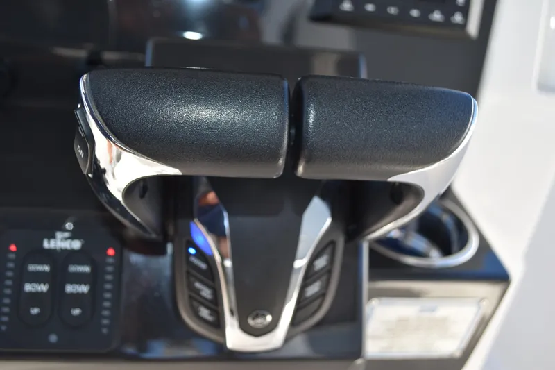 Slide: The Image of 2022 Pursuit S 268 Sport boat compartment with hoses and waste tank components. - 33