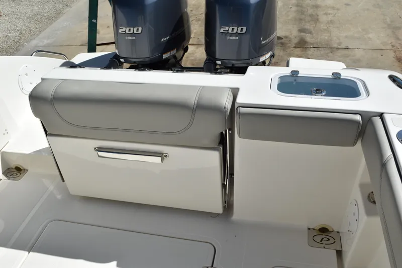 Slide: The Image of 2022 Pursuit S 268 Sport boat interior with toilet and sink. - 38