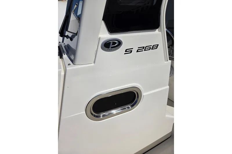 Slide: The Image of 2022 Pursuit S 268 Sport boat anchor detail in sunlight. - 4