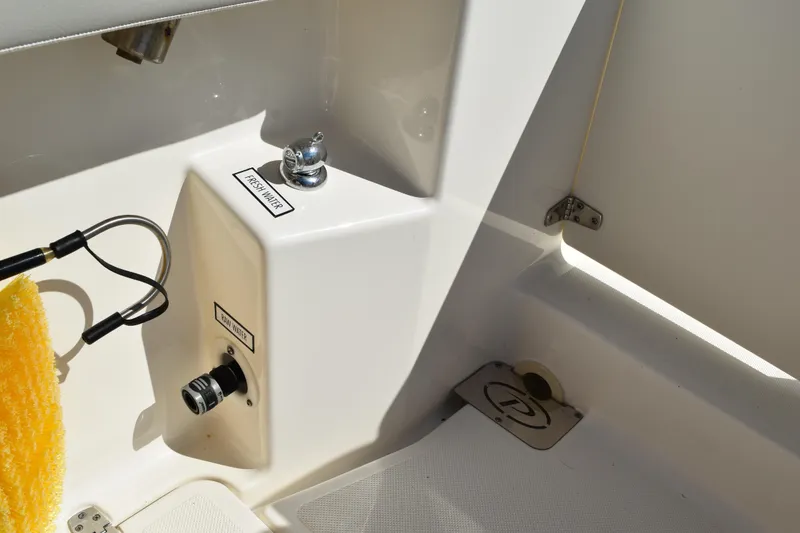 Slide: The Image of 2022 Pursuit S 268 Sport boat windshield with wiper and interior view. - 41