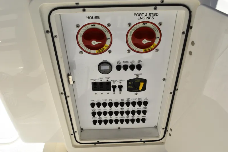 Slide: The Image of Interior view of a 2022 Pursuit S 268 Sport boat, showcasing storage compartments. - 45