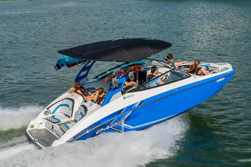 Slide: The Image of 2019 Yamaha Boats 242X E-Series interior with sleek seating and steering wheel. - 4