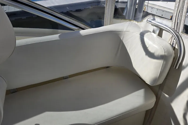 Slide: The Image of White seating area on a 2003 Albemarle 320 Express Fisherman boat. - 23