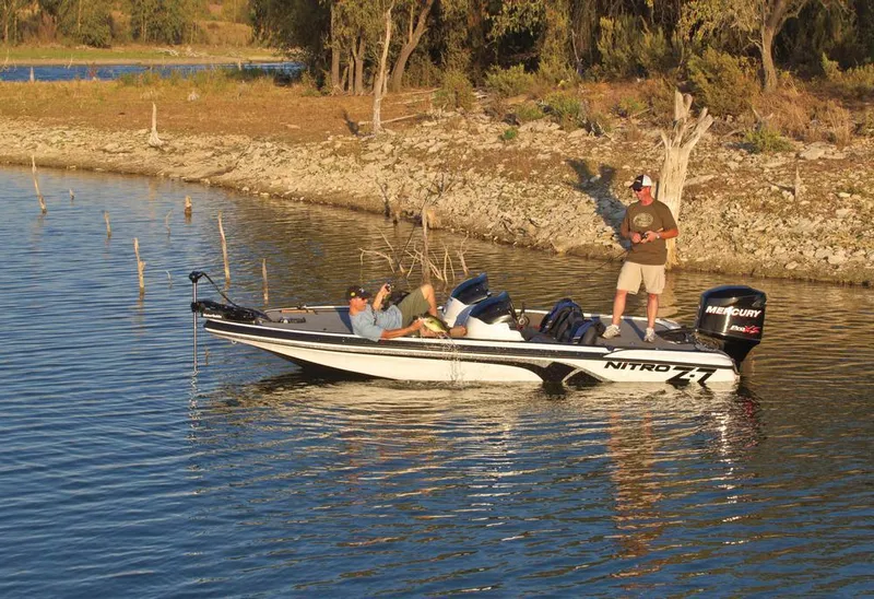 Slide: The Image of 2012 Nitro Z-7 boat interior with steering wheel and seating. - 4