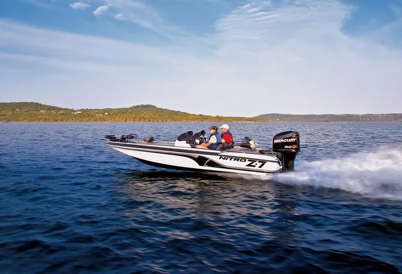 Slide: The Image of 2012 Nitro Z-7 boat interior with dual engines and seating. - 7