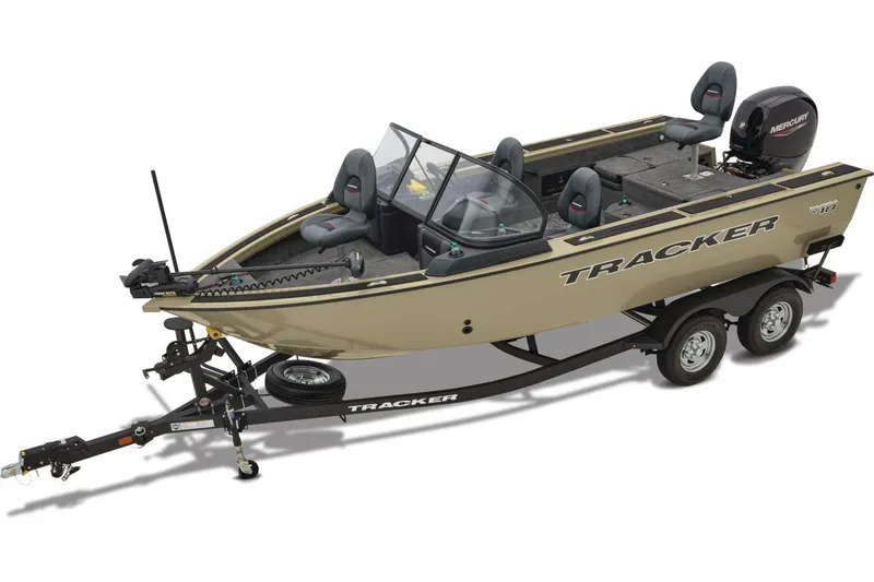 The Image of 2026 Tracker Targa V-18 Combo boat in vibrant red on trailer, under clear blue sky. - 0