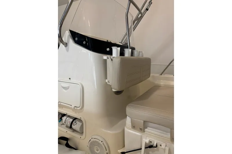 Slide: The Image of 2023 Boston Whaler 170 Montauk interior, featuring seating and storage compartments. - 4