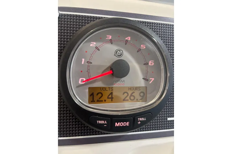 Slide: The Image of Gauge display on 2023 Boston Whaler 170 Montauk showing 12.4 volts and 26.9 hours. - 6