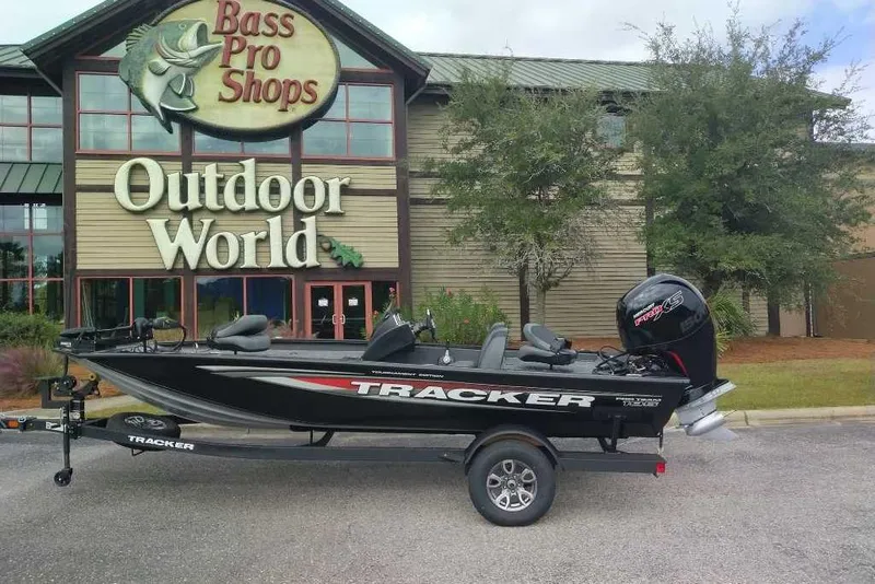 Slide: The Image of 2026 Tracker Pro Team 195 boat outside Bass Pro Shops Outdoor World. - 5