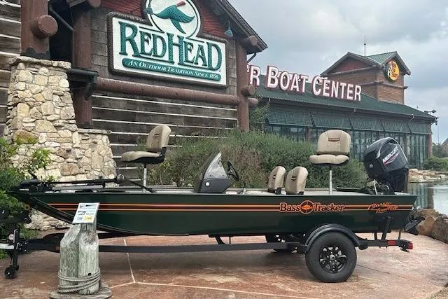 The Image of 2026 Tracker Bass Tracker Classic Limited boat displayed outside RedHead store. - 0