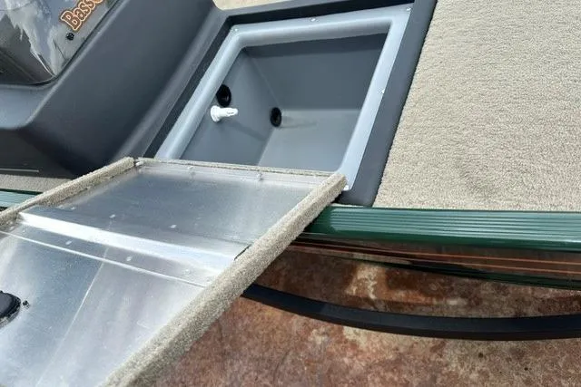 Slide: The Image of Open storage compartment on 2026 Tracker Bass Tracker Classic Limited boat. - 10